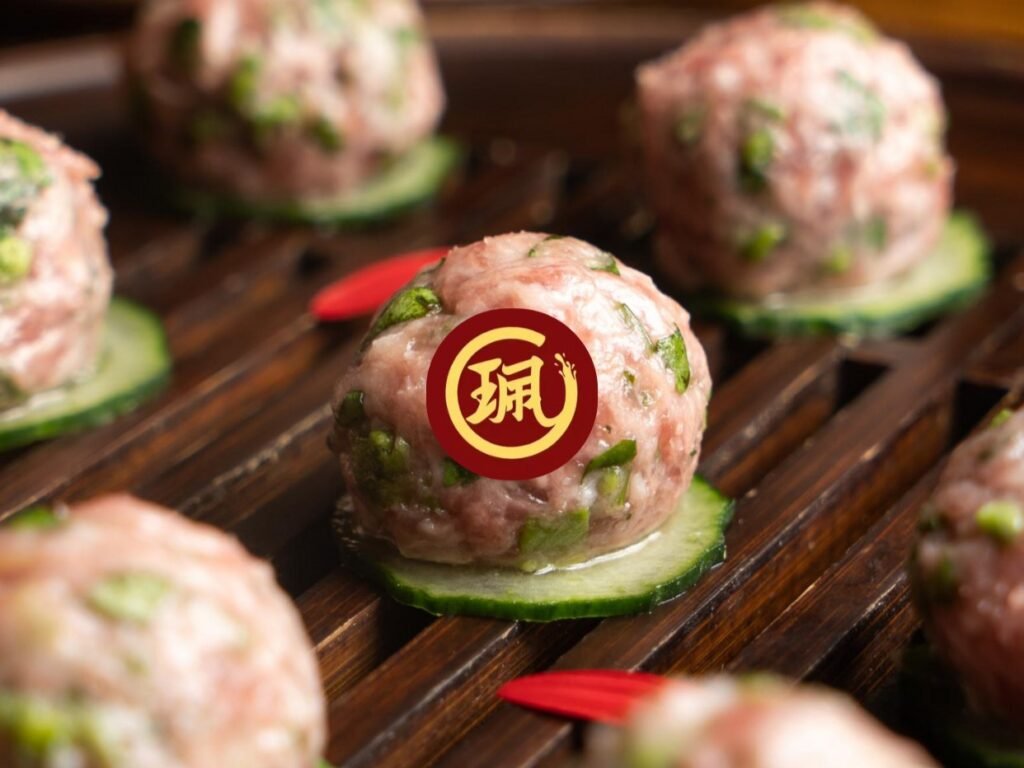 Chongqing hotpot with handcrafted stem lettuce pork meatballs at Peijie Hotpot Amsterdam